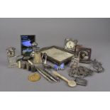 A collection of silver and other items, including four various sized photograph frames, a silver