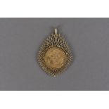 A 9ct gold pendant with Victorian full sovereign, the pierced hallmarked mount supporting an 1884