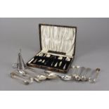 A large collection of silver and silver plated flatware, including a cased set of six teaspoons with