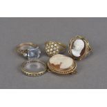 Five items of 9ct gold mounted jewellery, including a cameo ring and brooch, a seed pearl cluster