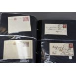 A collection of vintage First Day Covers and stamps, including an album with several FDCs and