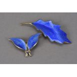 A Norwegian silver and enamel double leaf brooch by David Andersen, together with another similar