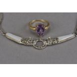 A modern 9ct gold and amethyst solitaire dress ring, together with a silver necklace with