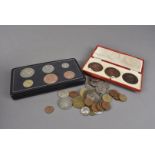 A collection of British coins, including a Victorian crown, six George VI proof 1945 coins in