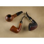 Three Stanwell Danish pipes, comprising a Jubileum 1942-92, marked 06 curved shape, also a Hexagon