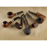 Two filter pipes, one by Brigham, another Kent De Luxe 250, and a Pipemake Magnum, also a