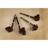 An interesting set of four Judds briar pipes, carved as card suits, spades, hearts, diamonds and
