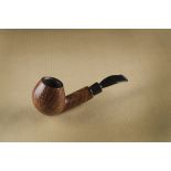 A Poul Winsløw briar estate pipe, the hand made curved pipe with straight grain, marked shank,