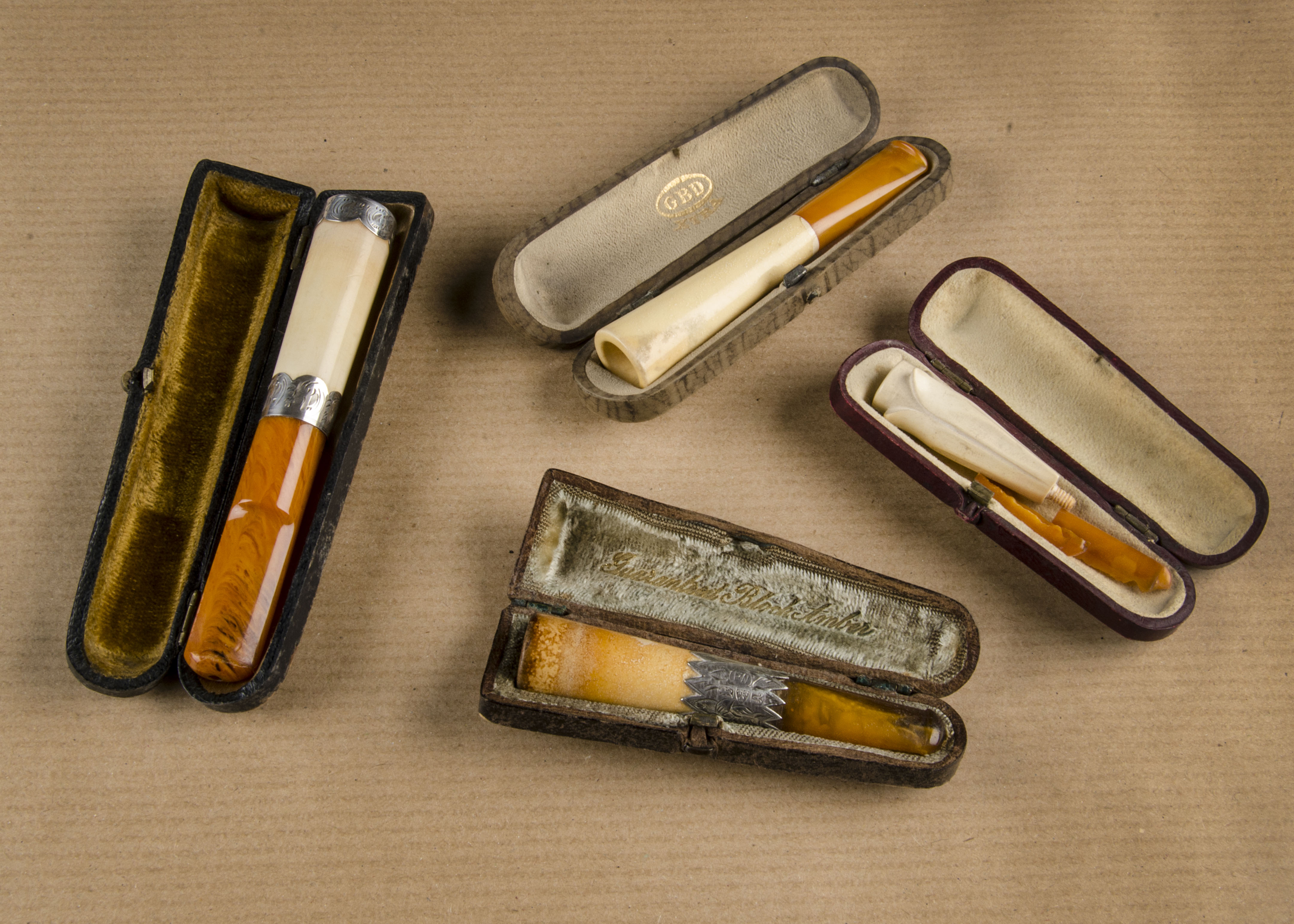 A GBD Extra meerschaum and amber stem cheroot holder, of plain conical form, in fitted case, also