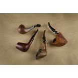 Four Nørding briar pipes, two free hand carved examples, comprising an FS square shaped with