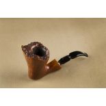 A Stanwell De Luxe, briar estate pipe, the free hand shape with straight grain, rusticated rim and