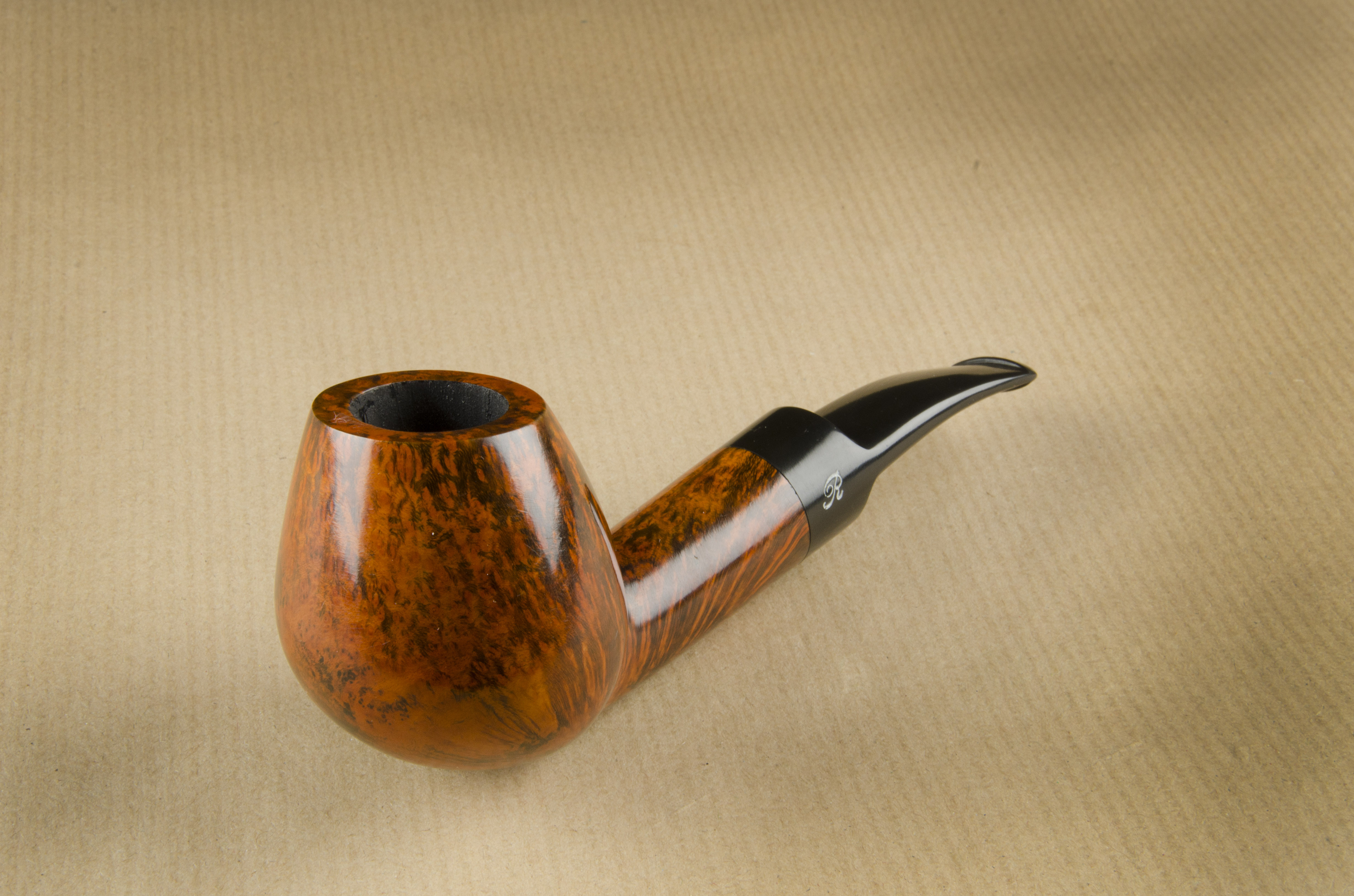 A Refbjerg briar estate pipe, the apple shaped bowl and stem, flame grain, and hand cut logo