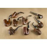 A collection of Boer War briar pipes, comprising a Baden Powell example, a Heilbron Orange River