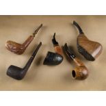 Five hand carved Italian briar estate pipes, including a large straight grain sitter, with