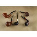 Five Stanwell Danish briar pipes, comprising a Vario horn shape with rustic bowl, no.126, a curved