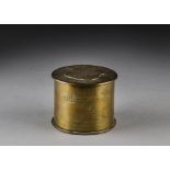 A WWI novelty tobacco jar and cover, from a brass shell case, dated September 1916 with engraved