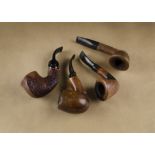 Four Danish briar estate pipes, comprising a Sevndborg half and half polished and rustic example