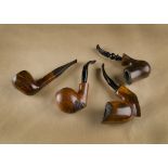 Four G.W.Sims briar estate pipes, all freehands, including three sitters and one with bulbous and