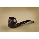A Cesare Barontini Livorno, briar estate pipe, of curved shape, with rusticated bowl, with tapered