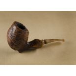 A Poul Winsløw briar estate pipe, hand carved sitter with sandblasted finish, and hand cut stem