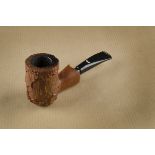 A Caminetto briar estate pipe, the sitter having a rusticated straight shaped bowl and worked