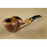 A Don Carlos estate twin chamber briar pipe, the single note marked pipe, having a shaped bowl,