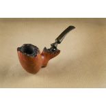A Knute of Denmark briar free hand estate pipe, the straight grain with rusticated rim and end of