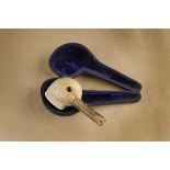 A novelty cased meerschaum pipe, the bowl carved in the form of ducks head with glass eyes and