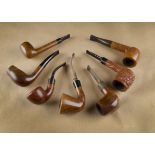 A collection of G.W Sims briar estate pipes,