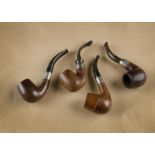 A collection of four briar estate pipes, comprising two Edward VII examples, an Imperial ITC