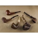 A collection of Danish briar estate pipes, comprising a George Jensen Canadian shaped De Luxe Gigant