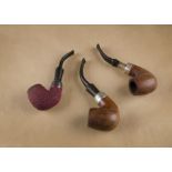 Two K & P Peterson of Dublin briar estate pipes, both with birdseye grain, smooth finish, one with