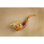 A novelty carved meerschaum pipe, modelled as a wild boar protruding from a crenelated turret with