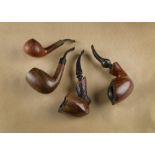 A collection of four Bari Danish estate pipes, including two free hand with polished bowls, a Wiking