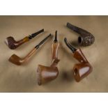 A collection of American estate briar pipes, including a large smooth sitter by Swinks, free hand