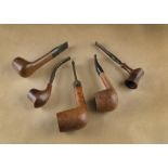 Five Butz-Choquin briar estate pipes, including a small sitting Flash, another curved, a Montfort St