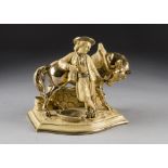 An Eichwald pottery novelty pipe stand, modelled as a young man and his horse heightened in gilt, 19