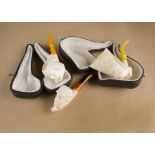 Three unsmoked meerschaum pipes, including a commemorative George Washington 1776-1976, cased, a