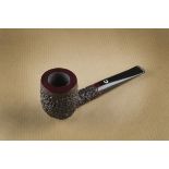 A Stefano exclusive briar unsmoked pipe, the apple shaped bowl with mixed grain, with brass