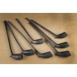 A collection of seven clay pipes, a 'Churchwarden' style in black with twisted stems 28 cm long (7)