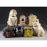 A pair of novelty tobacco jars with covers, modelled as seated pugs together with a modern