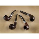 A Victorian briar estate pipe, the smooth polished bowl with silver collar marked London 1891,