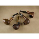 Four Danish briar estate pipes, comprising an Eriksen, a Knute sitter curved stem, an Aalborg and