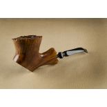 A Søren hand carved briar estate pipe, the free hand sitter, with straight grain, stamped 03 to