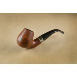 A Svendborg briar estate pipe, of curved design, the mixed grain, with silver collar and logo marked