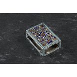 A Russian silver and enamel match box case, of rectangular shape, with blue, red, white and