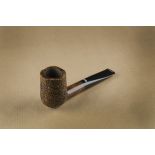 A Caminetto unsmoked briar pipe, the straight shape, with sandblasted finish, tapered stem with