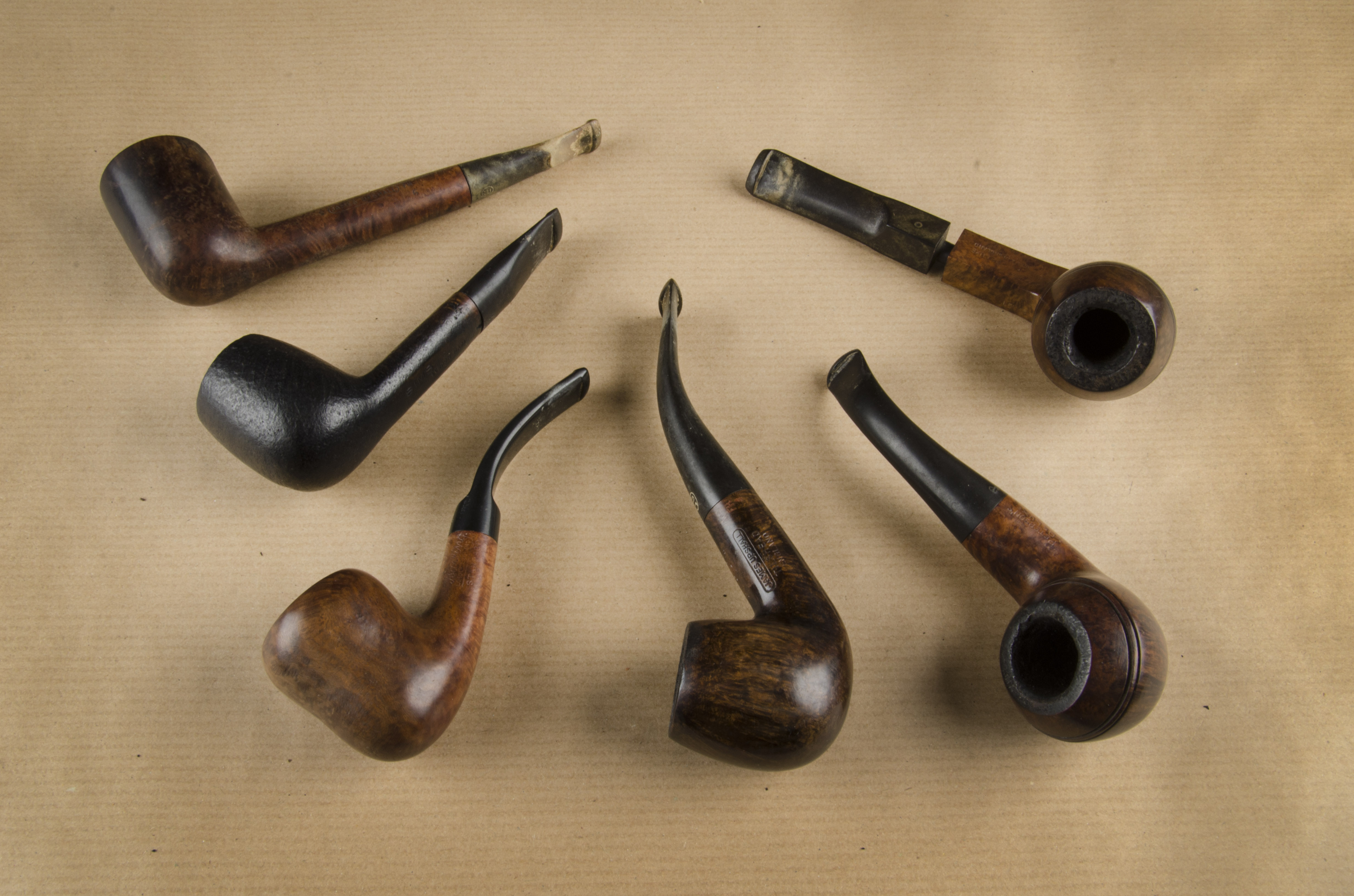 Six London made briar pipes, one sitter example by Sims, two by James Upshall and one by Barling and