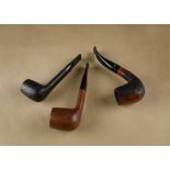 Three Stanwell Danish pipes, comprising a Canadian shaped rustic finish year pipe with inset panel