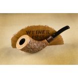 A Weiner briar unsmoked pipe, the horn shape with rusticated finish, a rosewood collar and curved